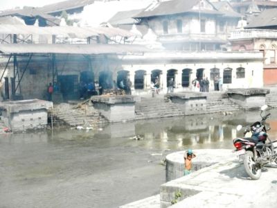 Near the Hindu temple, relatives were cremated on open fires to secure their place in paradise.
