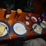 Fried eggs with hash browns...OK. Chapati bread with jelly...safe. Steamed momos...explosive consequences!