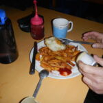 A typical "safe" meal - french fries and a fried egg.