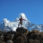 Ama Dablam.
Ama Dablam means "Mother's necklace"; the long ridges on each side are seen as the arms of a mother (ama) protecting her child, and the hanging glacier is thought of as the dablam, the traditional double-pendant worn by Sherpa women.