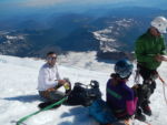 Steve and Cailie. Food break and blister prevention on Rainier summit day.